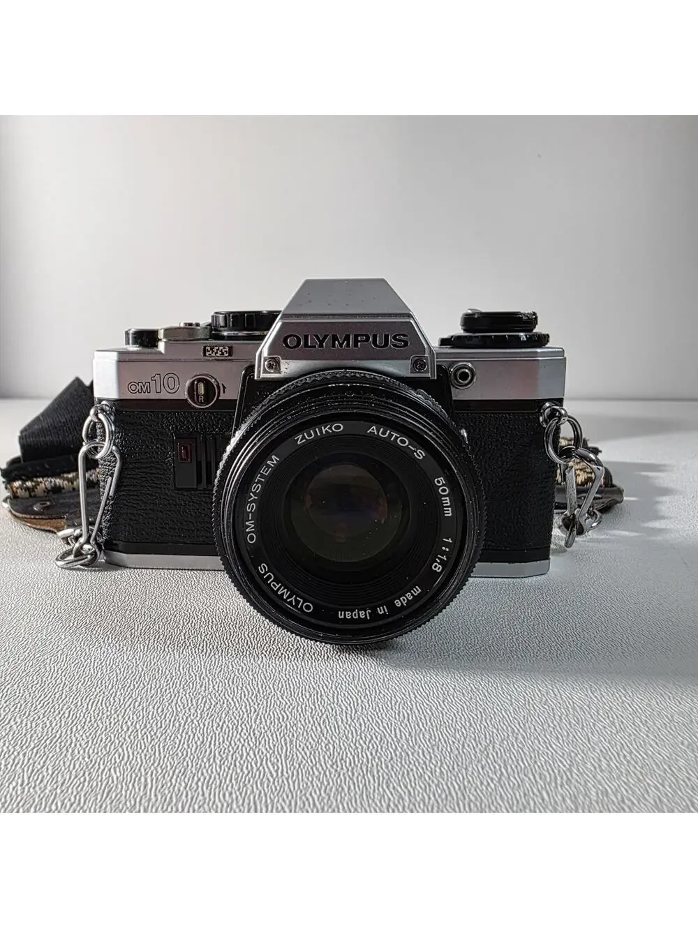 Olympus OM10 With Zuiko 50mm F1.8 Lens W/Neck Strap & Manual